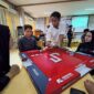 SERIUS - Para peserta sosialisasi mengikuti pelatihan olahraga domino. (Foto: RA)